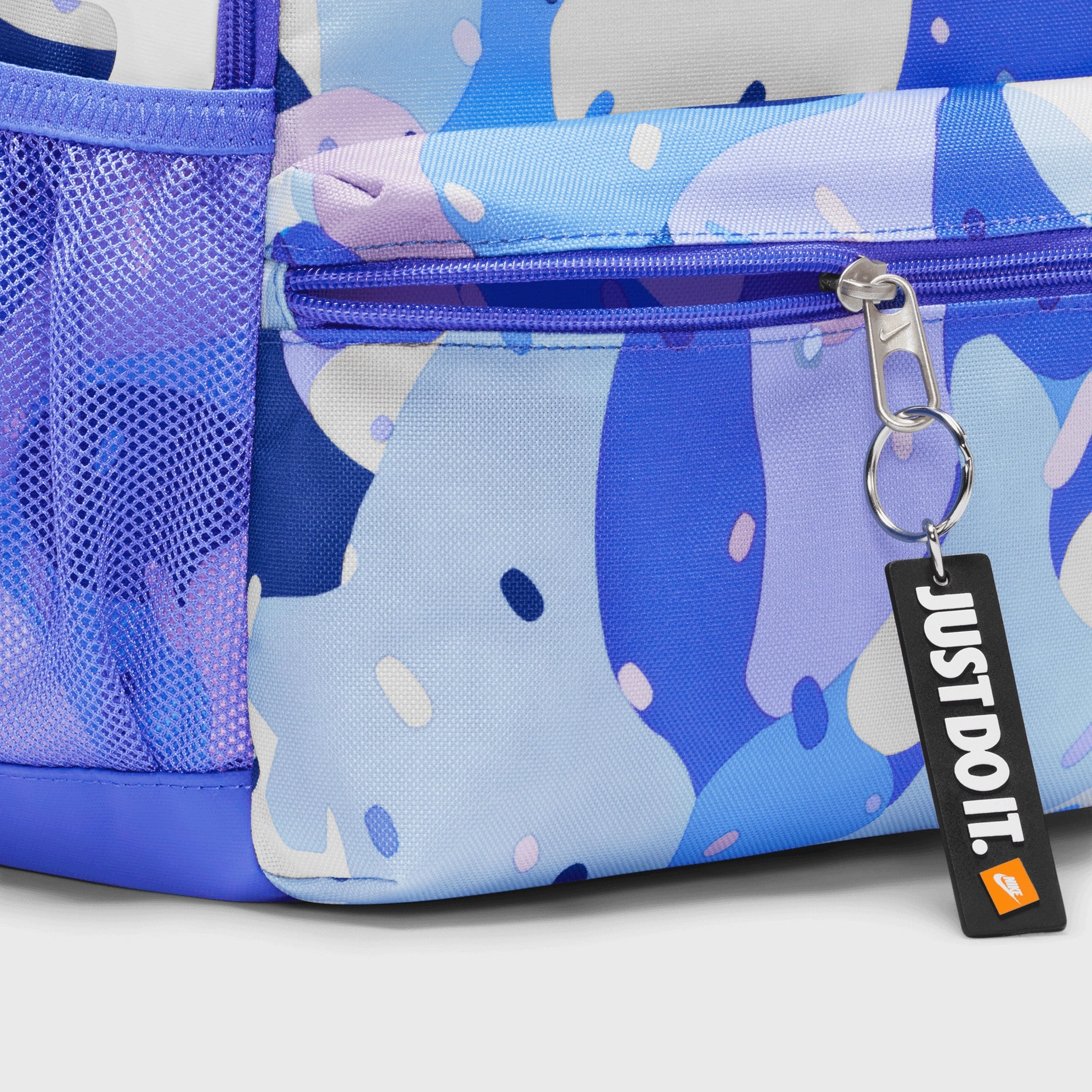 Nike Kids' Brasilia JDI Printed Mini Backpack Comet Blue / Light Thistle - White