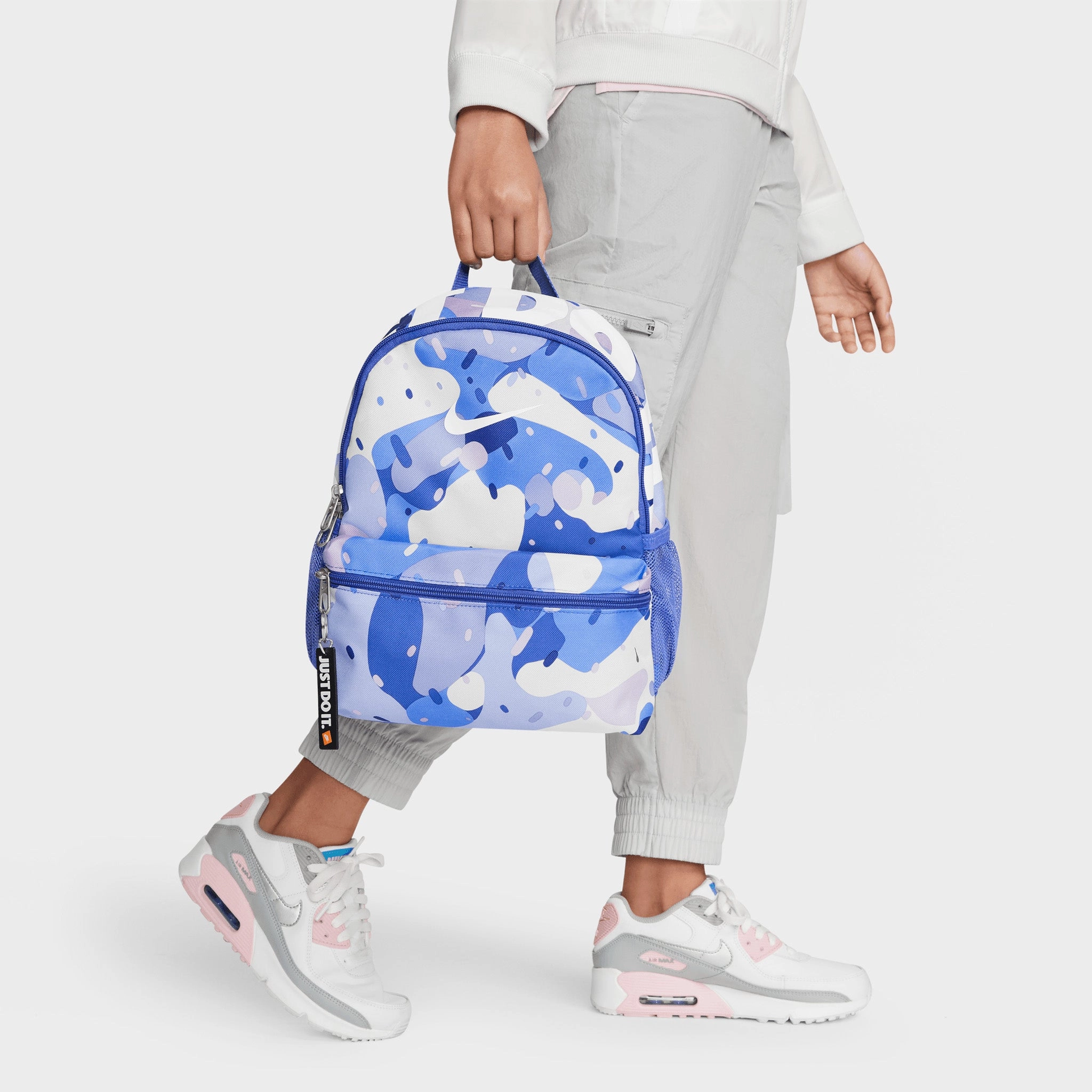 Nike Kids' Brasilia JDI Printed Mini Backpack Comet Blue / Light Thistle - White